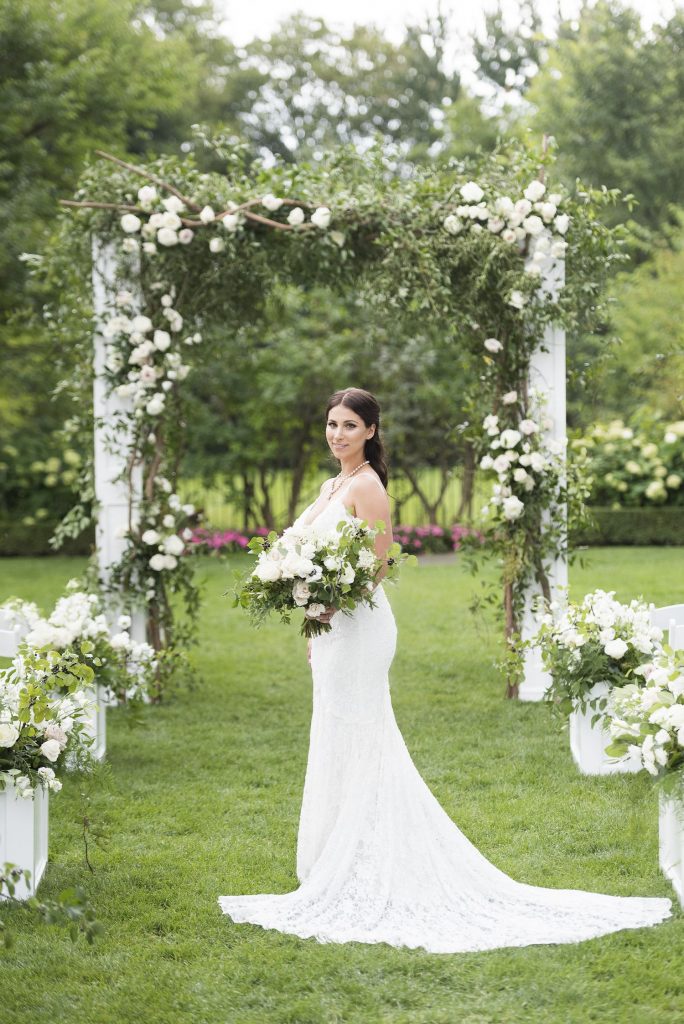 cara zack wedding floral arch