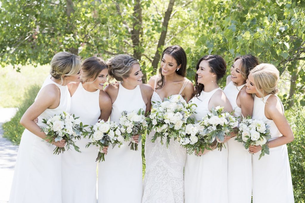 white bridesmaids flowers