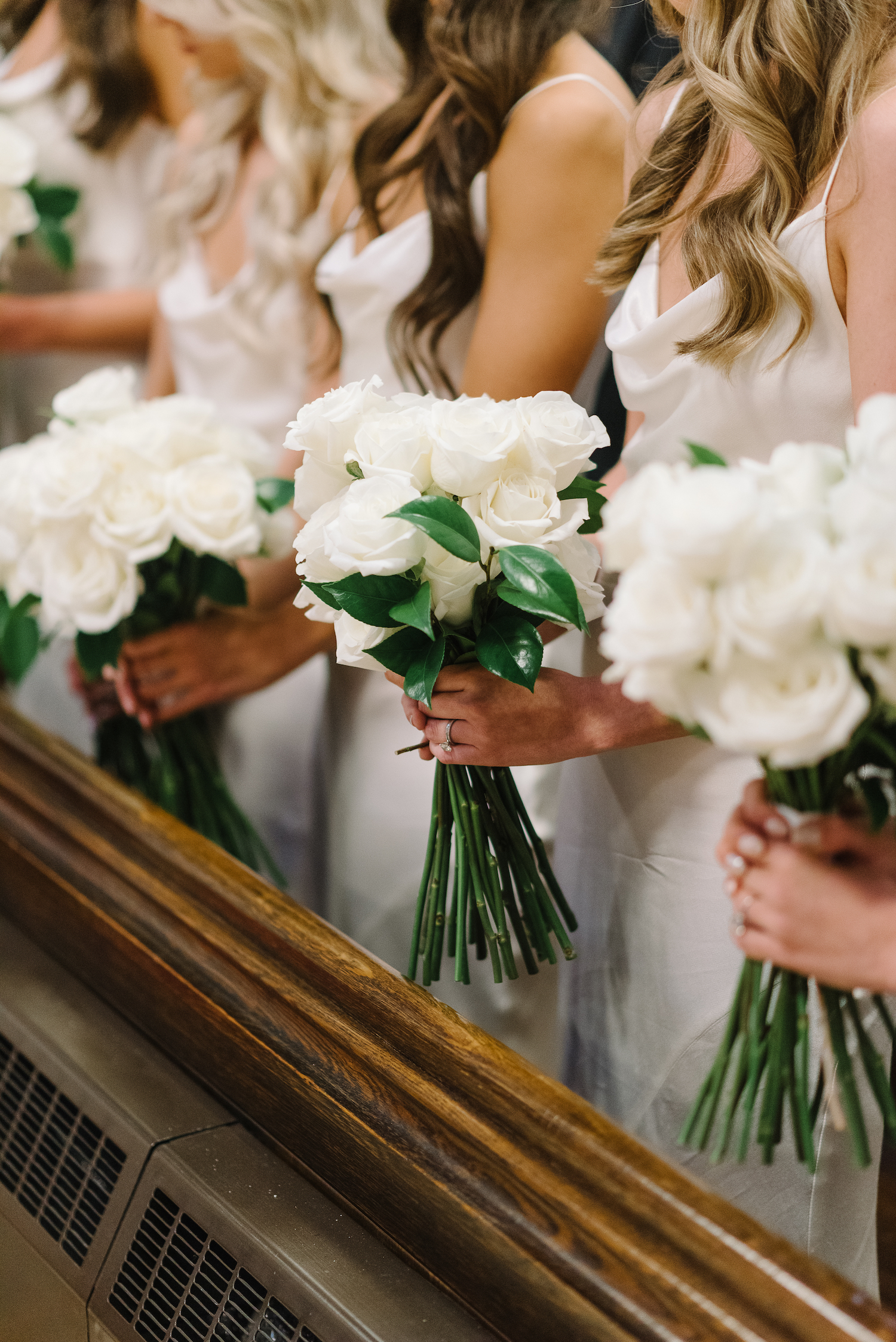 bridesmaids bouquets white roses