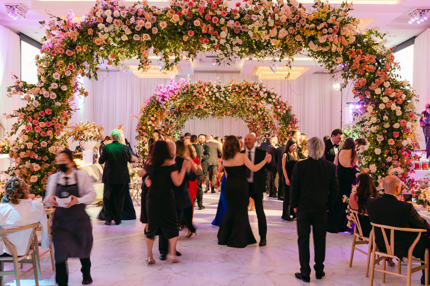wedding dancing under the flowers